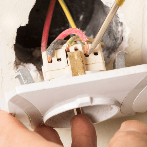 Untitled design (60) Fixing switch board with screw driver